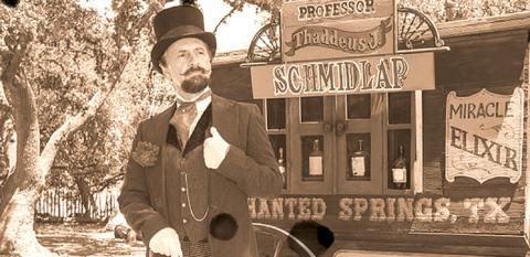 "Professor Thaddeus Schmidlap" (historical intrepreter Ross Nelson), the resident snake-oil salesman at the Enchanted Springs Ranch. (Public Domain)