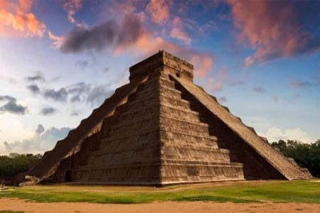 El Castillo during the equinox showing the undulating image of a serpent. Source: SOMATUSCANI / Adobe Stock